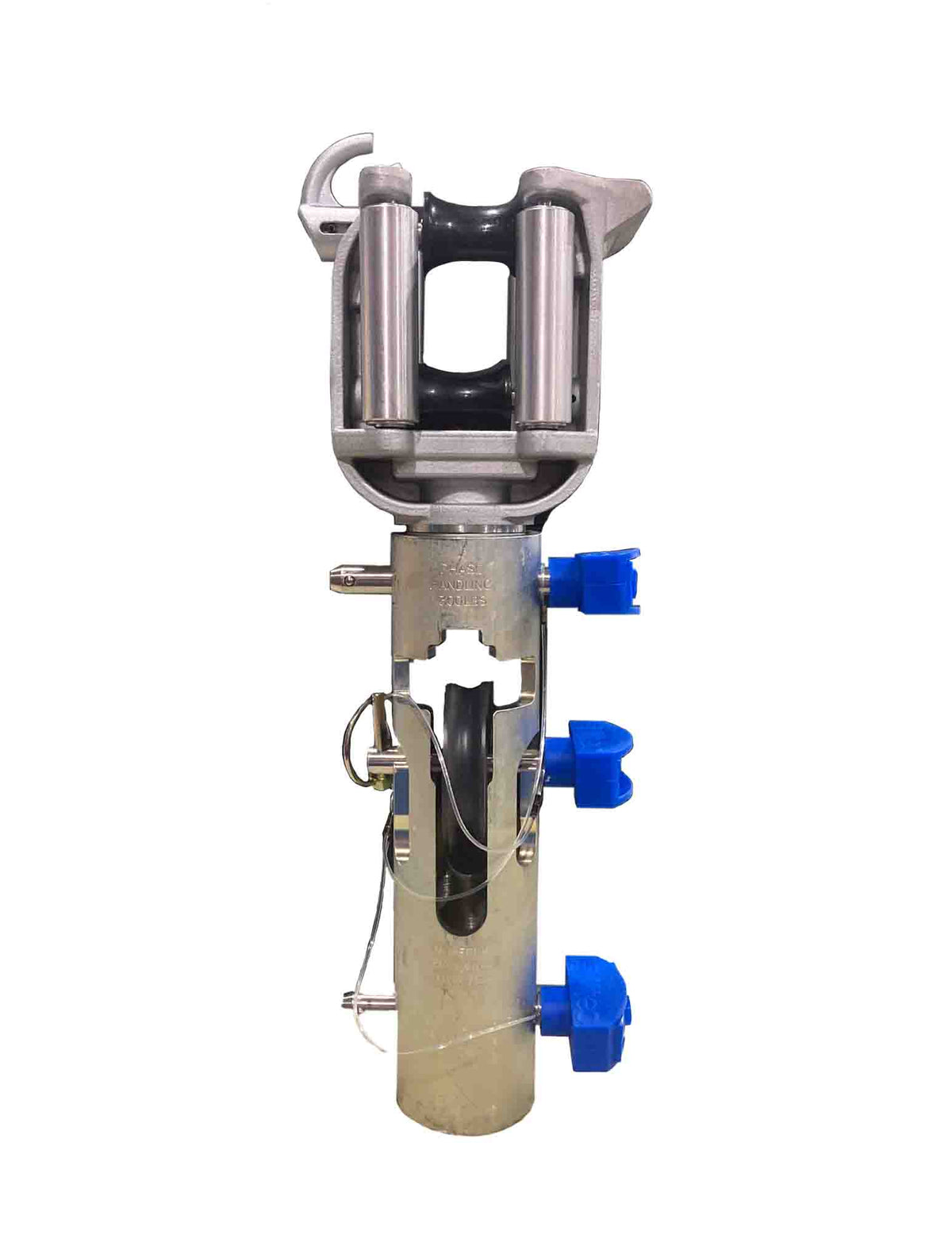 Metal cable-stringing or pulling block assembly displayed vertically on a light gray background. The device features a silver metal frame with two vertical rollers at the top surrounding a black center wheel. Below the roller assembly is a cylindrical metal housing containing a black pulley, secured with multiple locking pins and retaining clips. Three blue adjustment knobs protrude from the right side of the housing, and several metal attachment points and safety pins are visible throughout the unit. The i