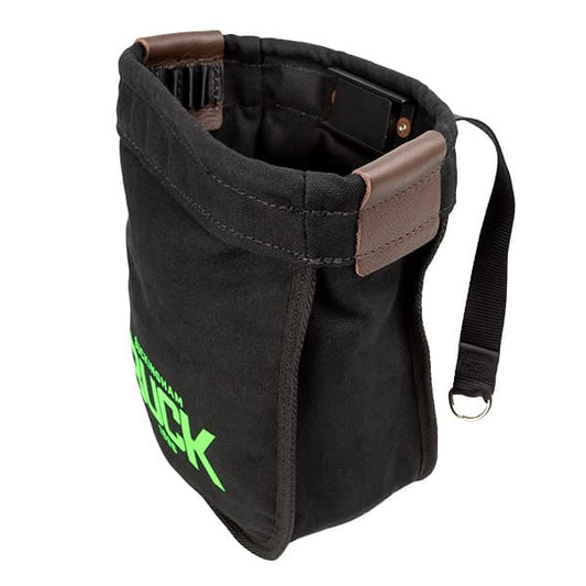 Black fabric tool pouch with reinforced brown trim displayed on a light gray background. The pouch has an open-top design with multiple interior tool slots, a side strap ending in a metal ring, and visible stitching along the seams. Bright green “Klein Tools” branding is printed on the front lower section of the pouch. The bag is shown at an angled perspective, highlighting both the exterior and interior storage compartments.