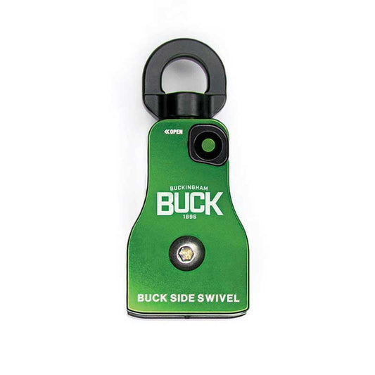 Green Buckingham BUCK 1896 side swivel device with a black circular attachment loop at the top and a black release button near the upper right corner. The front features the text “BUCK SIDE SWIVEL” and a central metal fastener. The product is shown against a light gray background.