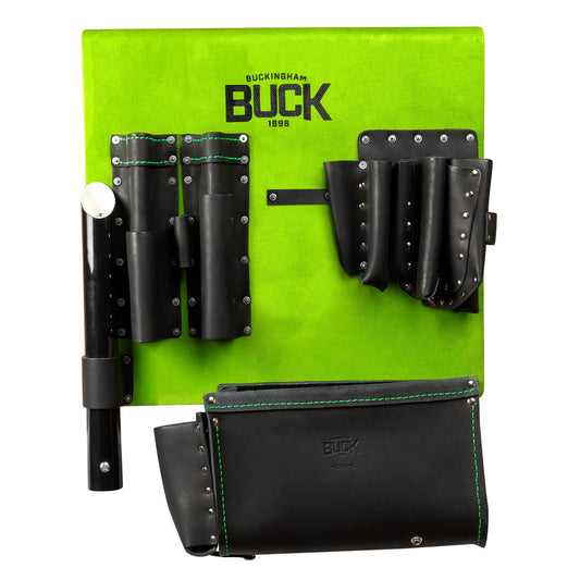 Bright green tool organizer panel with multiple black leather tool holders and pouches attached to the front. The panel displays the "Buckingham BUCK 1866" logo near the top center. Several cylindrical tool sleeves, a larger multi-pocket holder, and a detachable black storage pouch with green stitching are mounted on the panel. The product is shown against a light gray background.