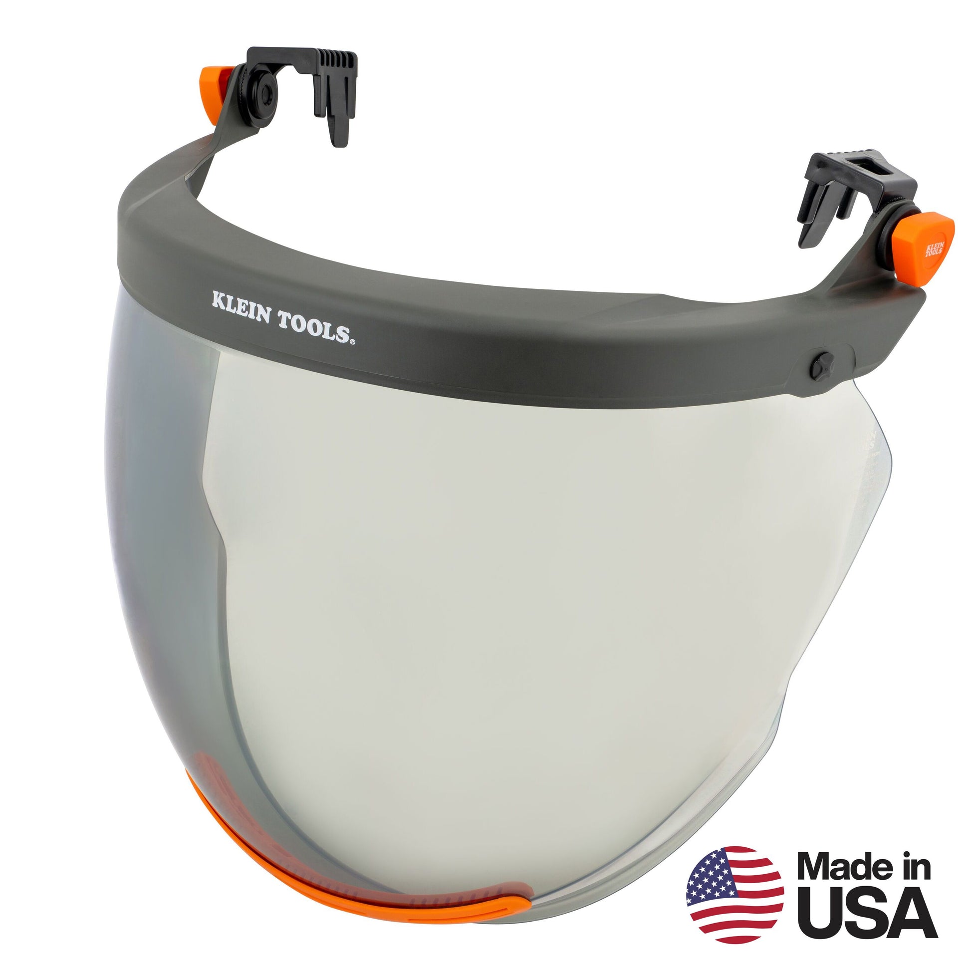 Clear full-face protective shield with a black headgear frame, orange adjustment components, and mounting clips for attachment to a hard hat. The shield features Klein Tools branding on the front and is shown against a light gray background with a “Made in USA” logo in the lower-right corner.