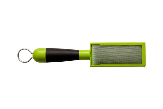 Handheld wire-mesh cleaning tool displayed horizontally on a light gray background. The tool features a rectangular metal mesh cleaning surface set within a bright green plastic frame. A black-and-green ergonomic handle extends from the frame and ends in a metal hanging loop for storage. The compact tool is designed for scraping or cleaning debris from surfaces, with the textured mesh panel prominently visible.