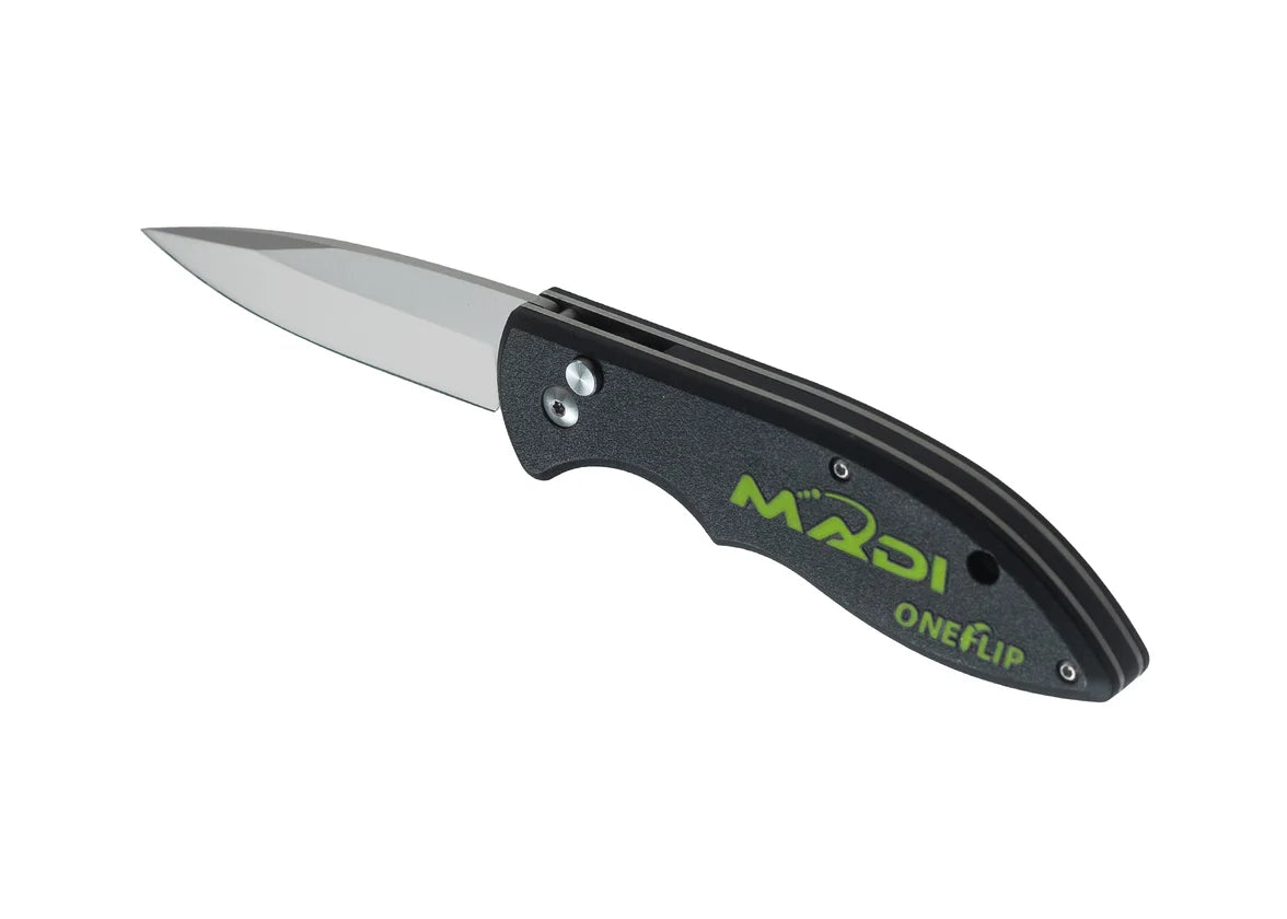 MADI OneFlip folding pocket knife with a satin-finish drop-point blade and a black textured handle. The handle features the green MÜDI logo and “ONEFLIP” branding, along with visible pivot hardware and a compact ergonomic design. The knife is shown open against a light gray background.