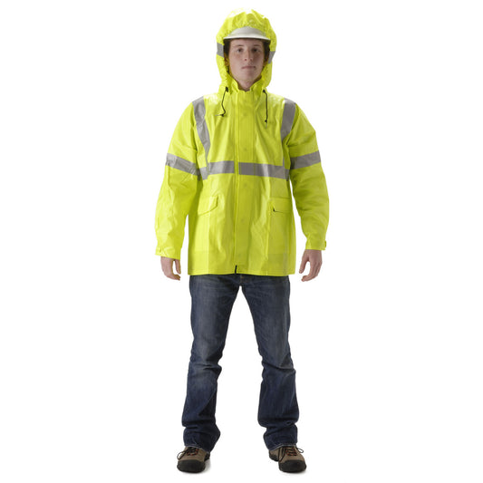 Person modeling a high-visibility yellow rain jacket with a hood and reflective silver striping across the chest, shoulders, and sleeves, displayed against a light gray background. The jacket is worn over blue jeans and work boots, and the wearer also has on a white hard hat beneath the hood. The jacket features a full front zipper, adjustable hood drawstrings, and front patch pockets designed for outdoor or jobsite visibility and weather protection.