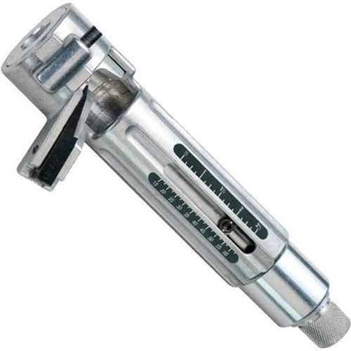 Silver metal adjustable cable stripping tool with a cylindrical body, measuring scale windows, and an adjustable cutting head, displayed diagonally against a light gray background. The tool features a black cutting blade assembly near the top and a knurled adjustment knob at the base for precise depth and length settings.