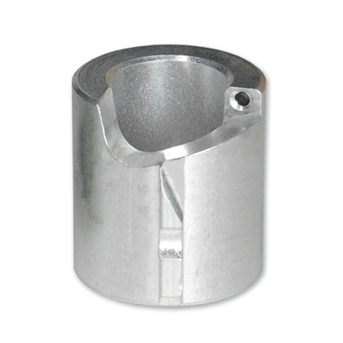 Cylindrical silver metal cable stripping or preparation tool component with a precision-machined body and open side slot, displayed against a light gray background. The tool features a beveled upper opening, a visible internal cutting edge, and a small mounting hole near the rim.