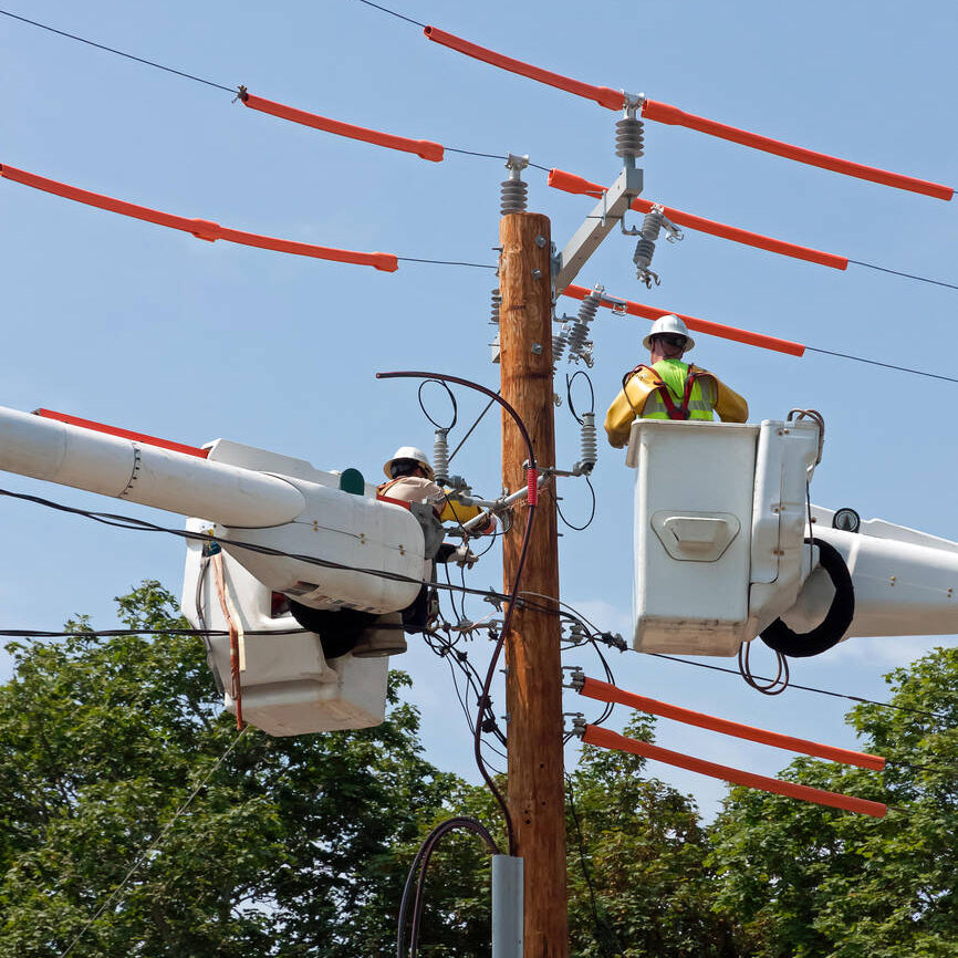 Linemen fixing powerlines lifestyle image